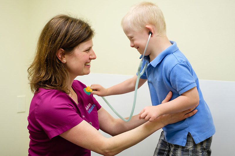 A Child Playing With a Doctor